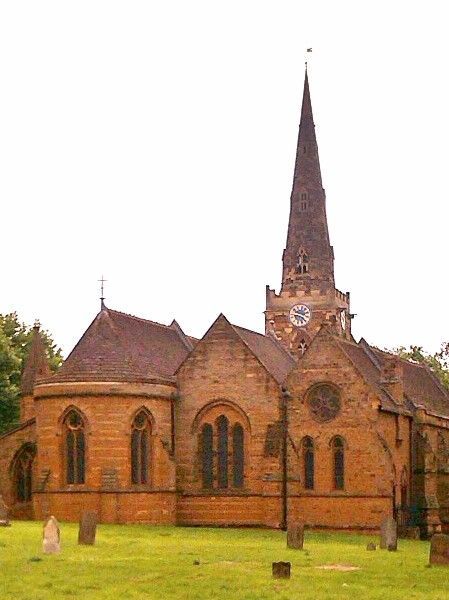 A church with a steeple and a clock on it