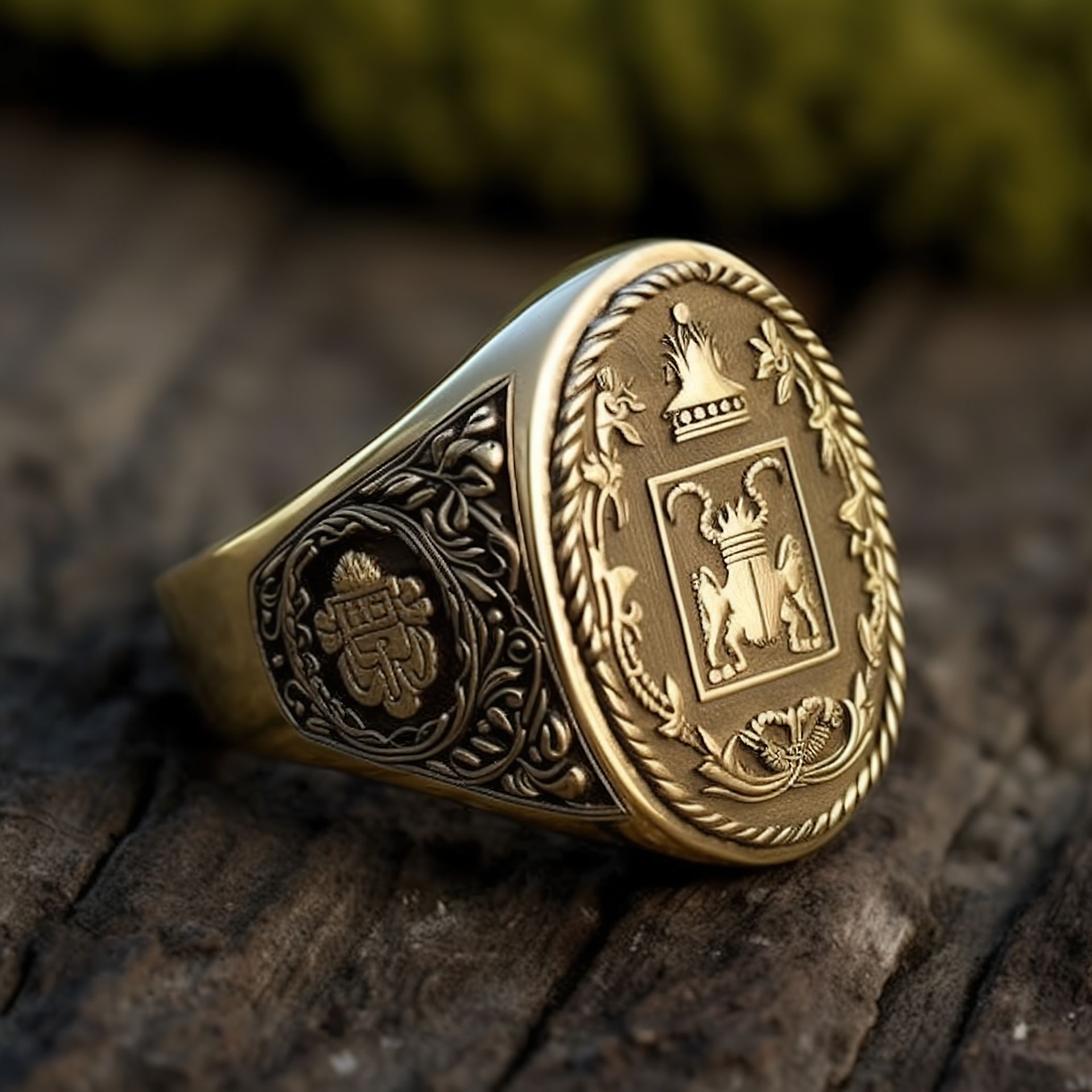 A gold ring with a coat of arms on it is sitting on a wooden surface.