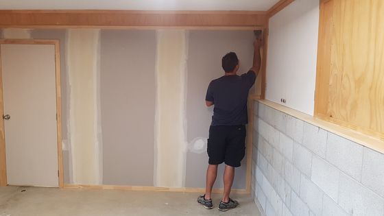 man plastering