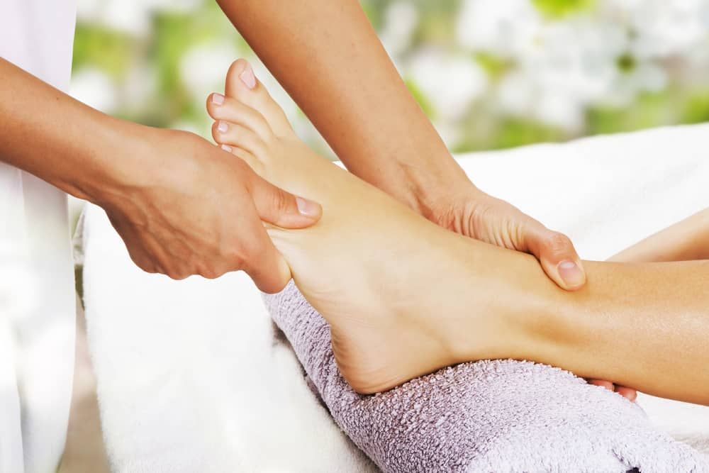 Woman Getting A Foot Massage At A Spa — Mobile Massage on the Gold Coast, QLD