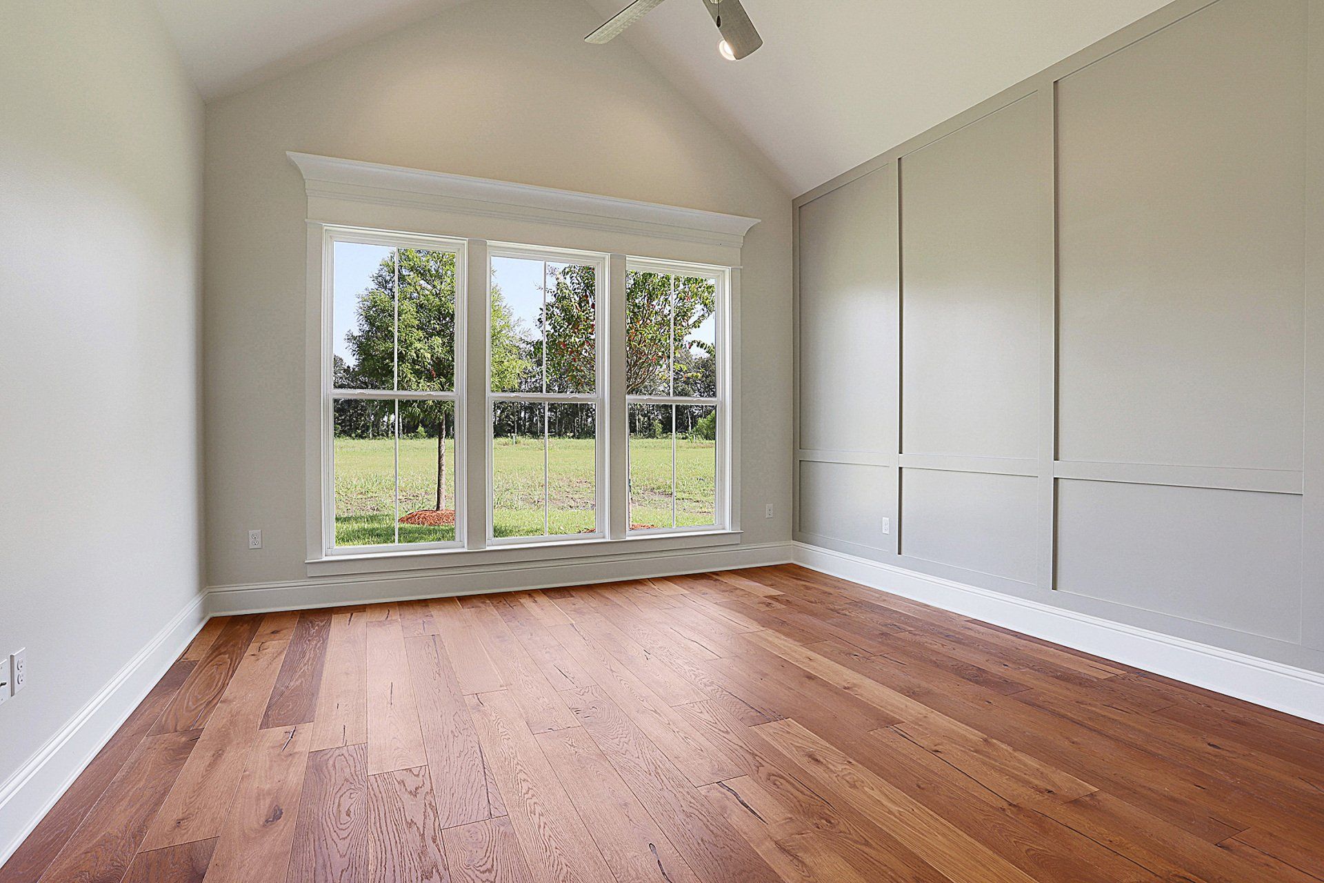 bedroom remodel with large vaulted ceiling