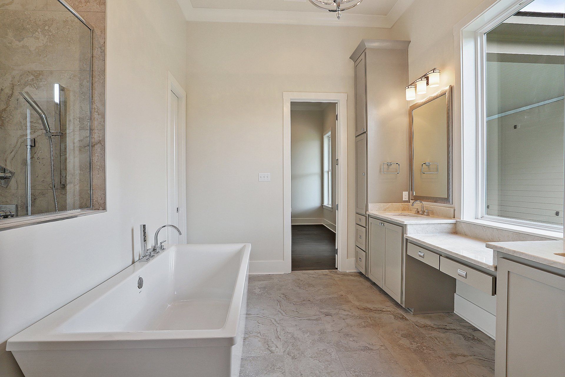 white bathroom with freestanding tub