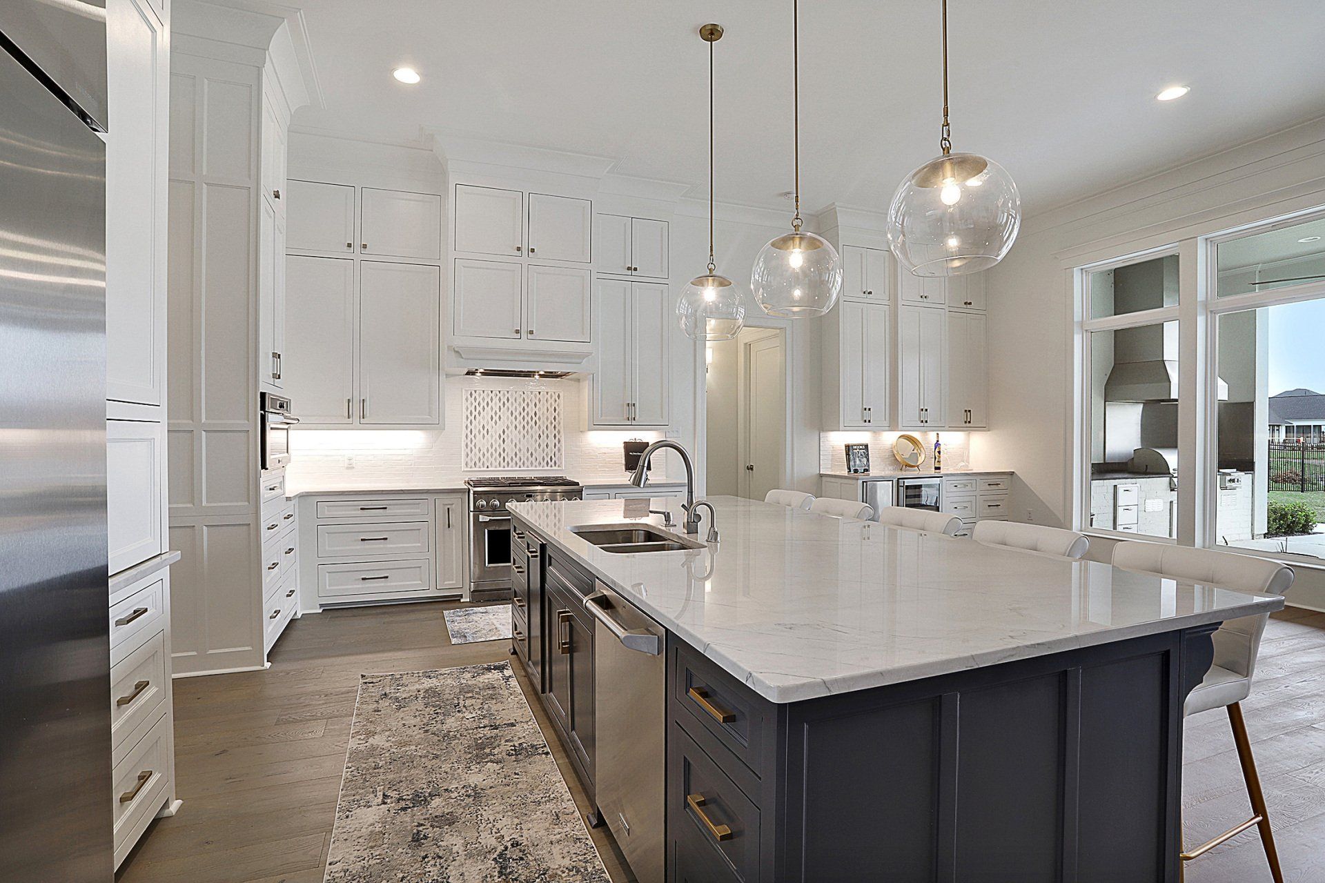 dark kitchen island with quartz