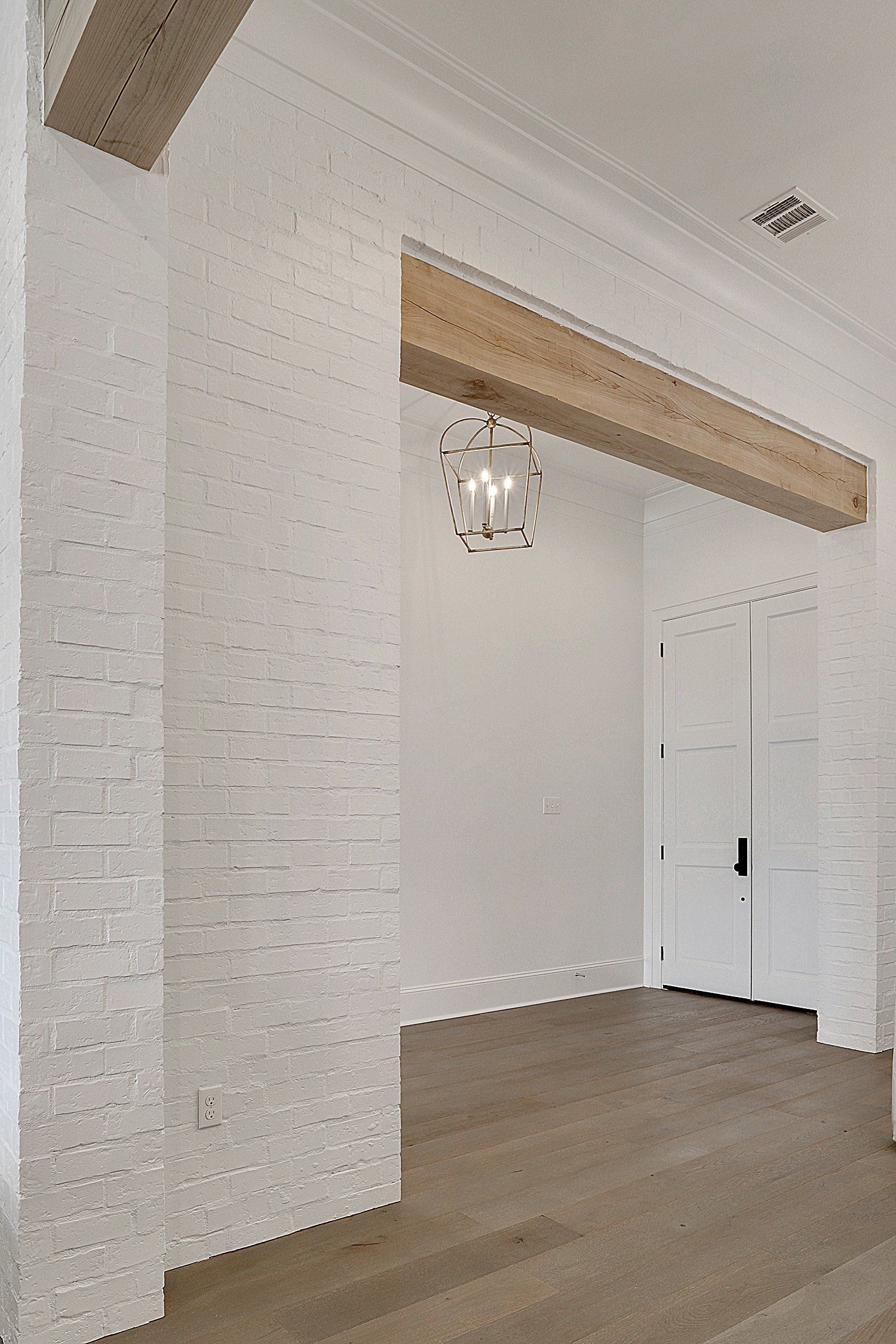 entryway with cypress beams