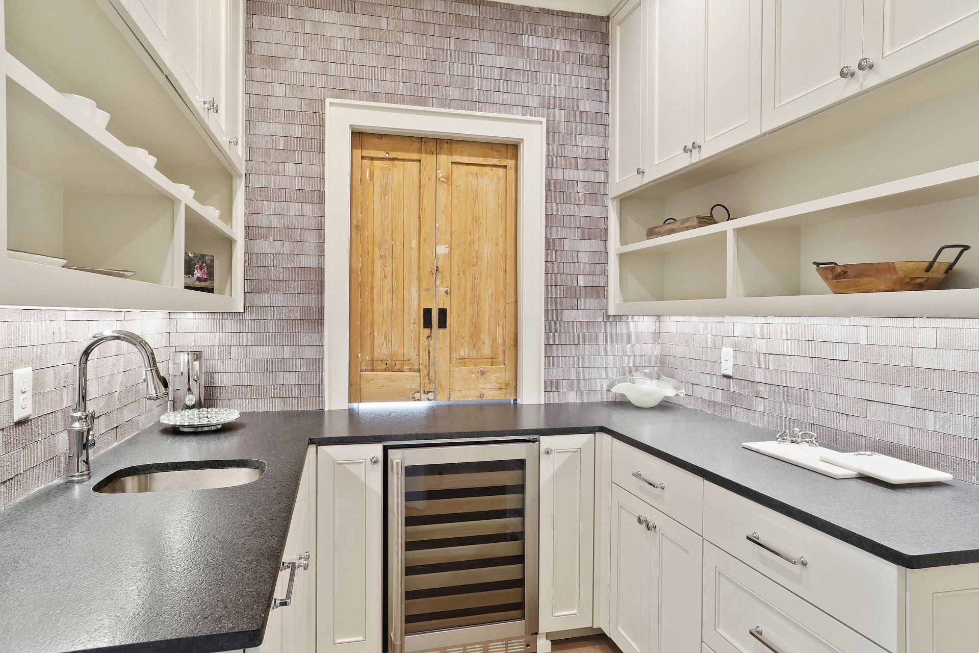 dark color kitchen with cypress doors renovation
