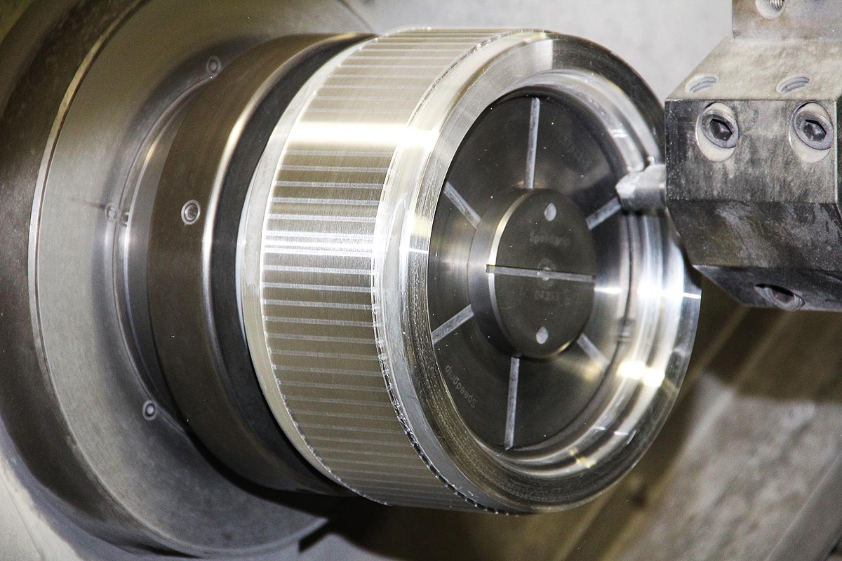 Finished Die cast rotor being burnished, reamed, machined, brushed and ground made from electrical steel laminations