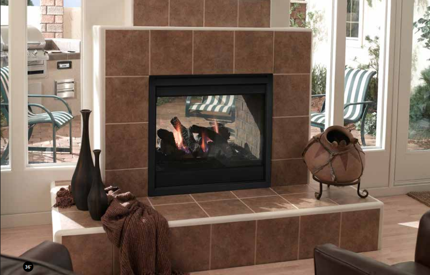Living room fireplace with tan tile surround and decorative vases on either side