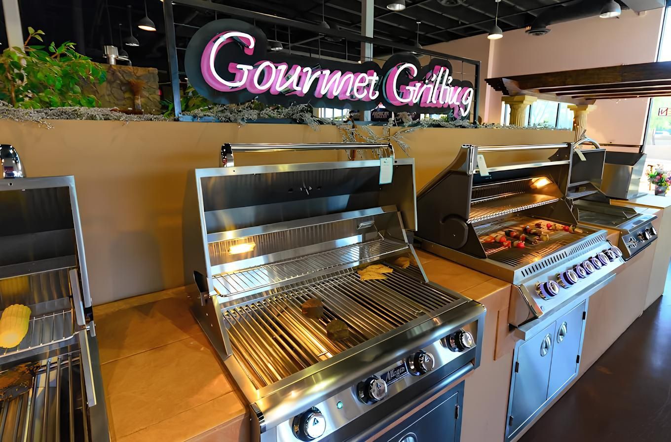 Stainless steel BBQ grills on display