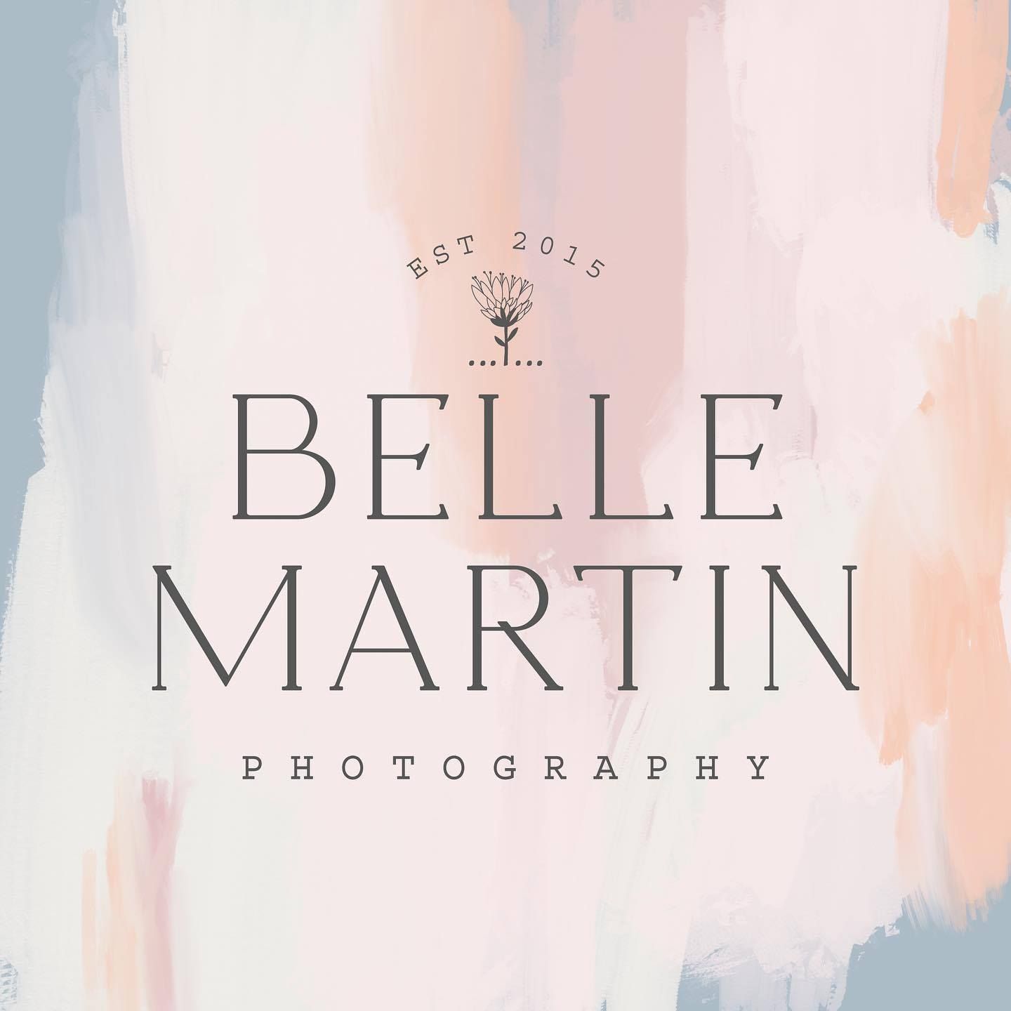 A logo for belle martin photography with a tree on it