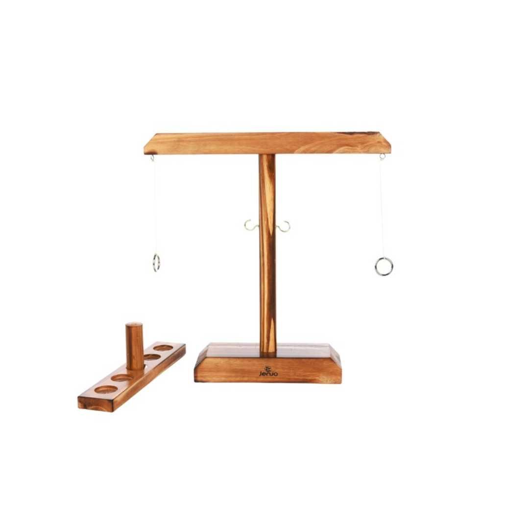 A wooden ring toss game on a white background.