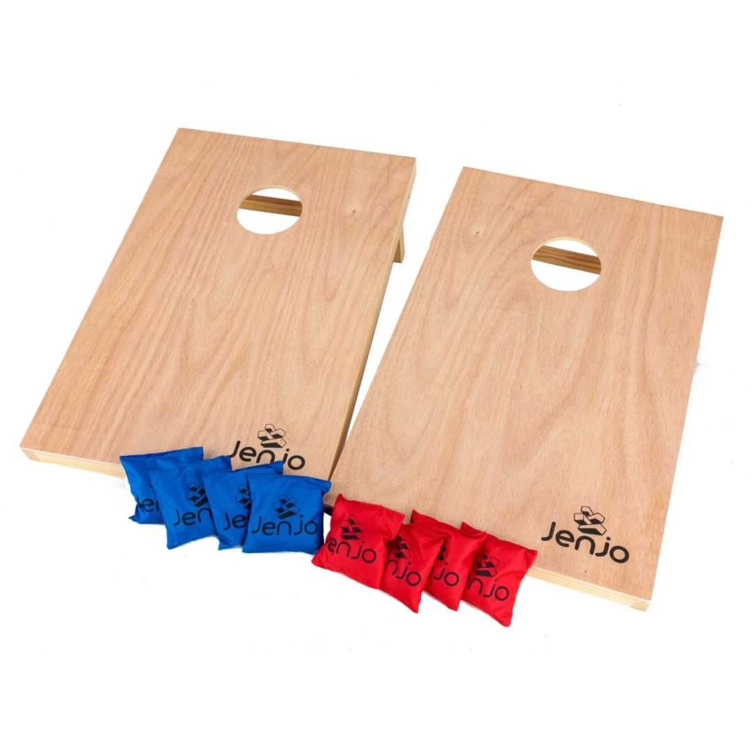 Two wooden cornhole boards with red and blue bags