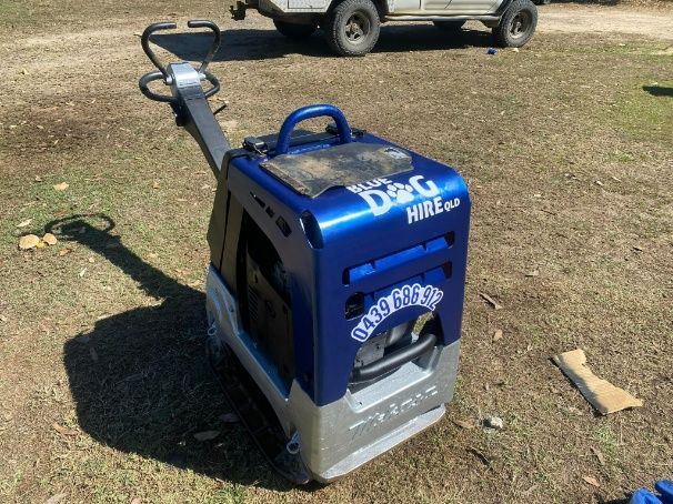 A Blue And Grey Machine That Says Blue Dog Hire On It — Blue Dog Hire Qld In Midge Point, QLD