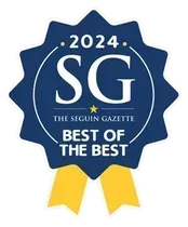 A blue, star-shaped award seal for 2024 with
