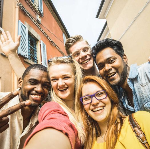 A group of people are posing for a picture together