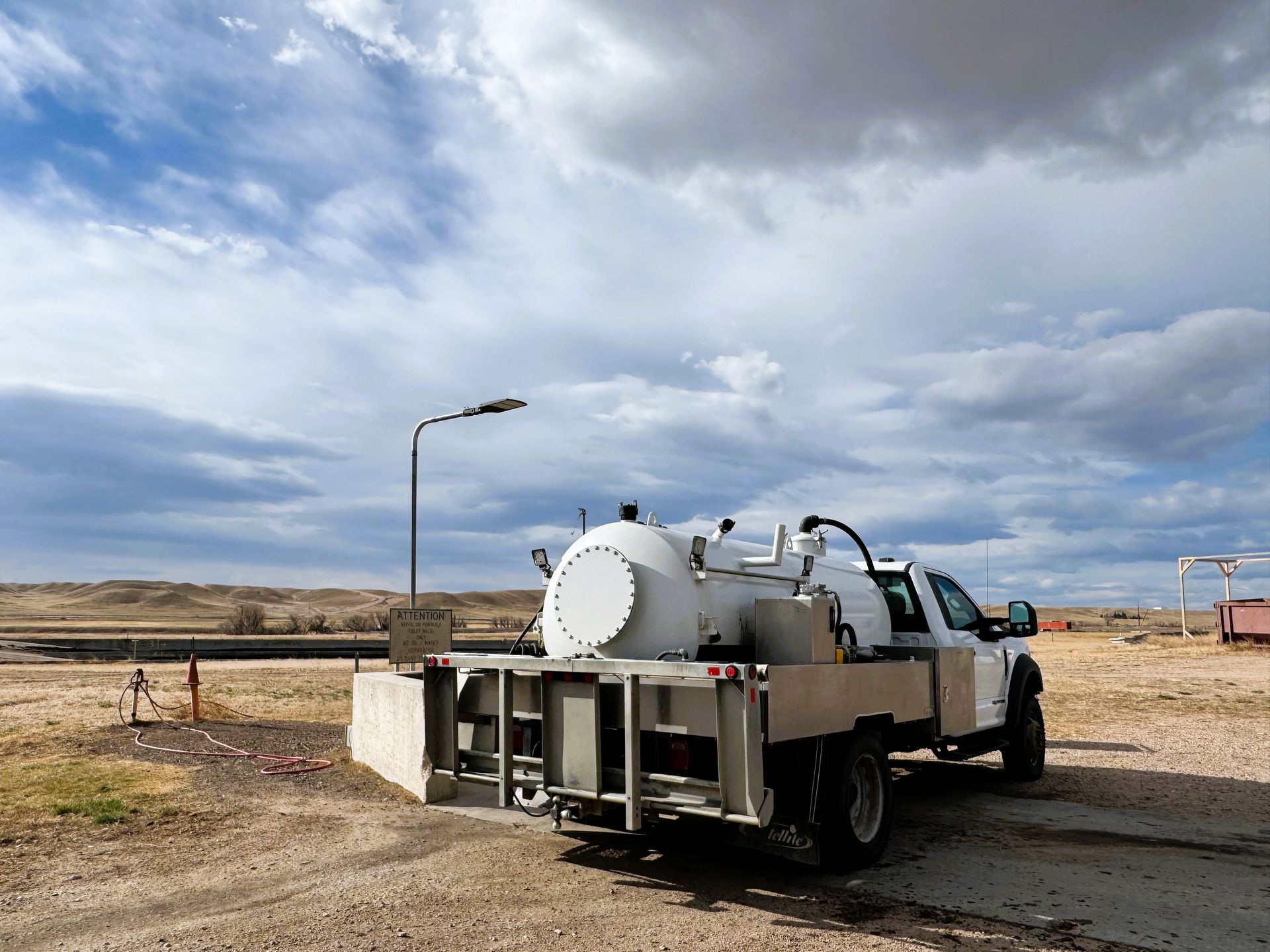 A White Truck With a Tank | Cheyenne, WY | Toilets On The Go, LLC