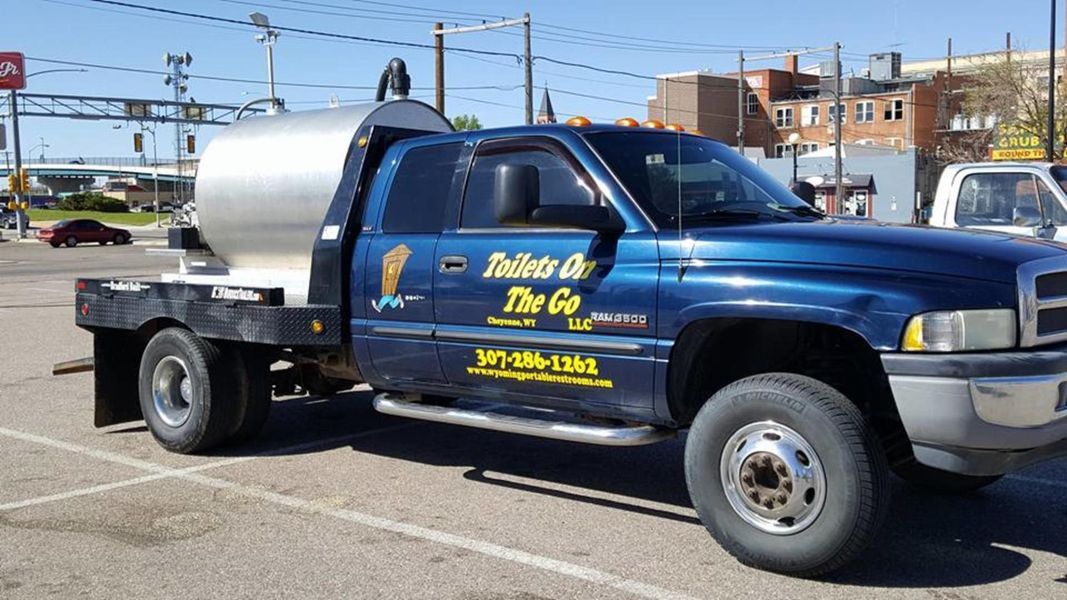 A Blue Truck is Parked in a Parking Lot | Cheyenne, WY | Toilets On The Go, LLC