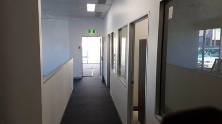 Under Refurbished Office Hallway — Acheson Building Certification In Coffs Harbour NSW