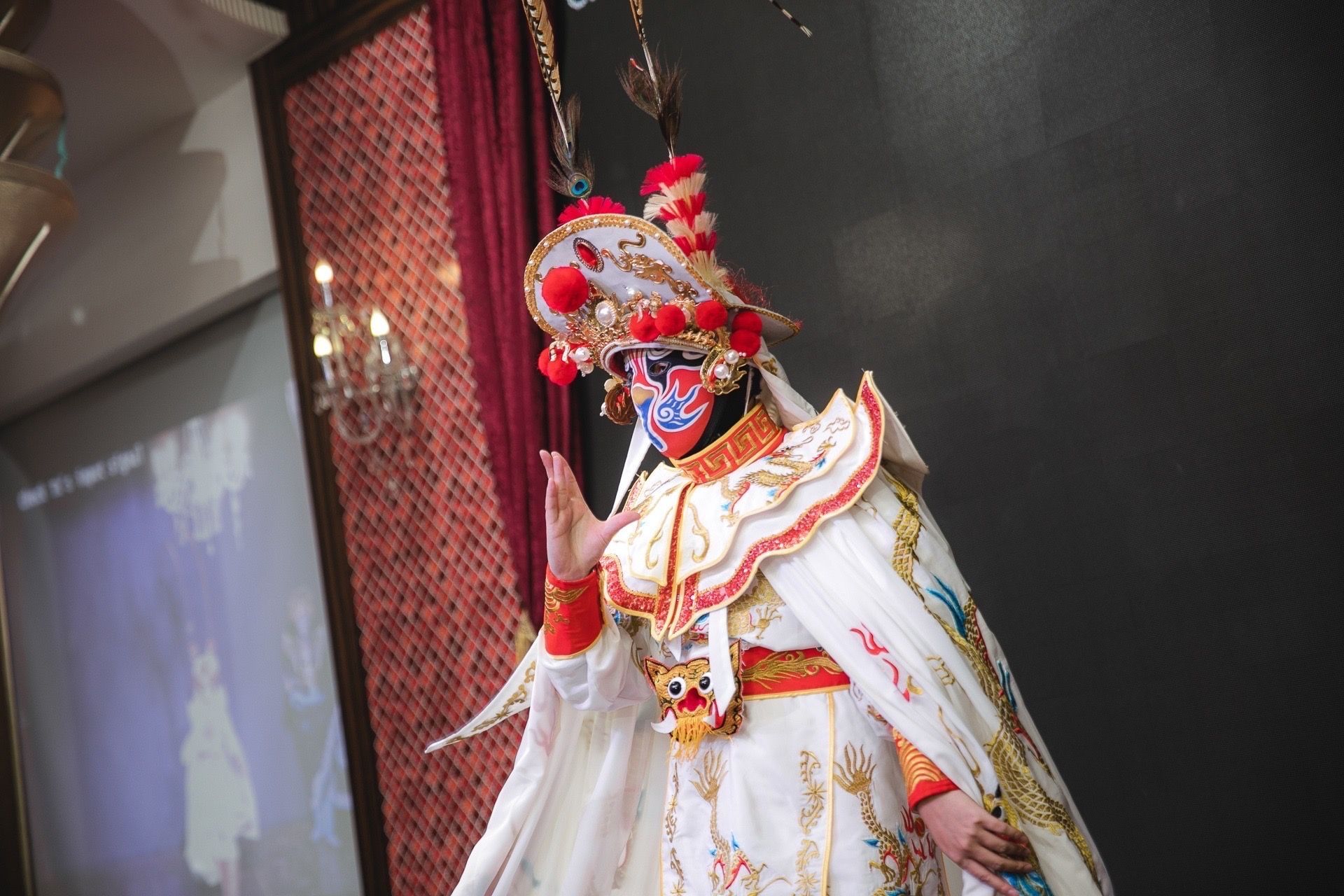 A person in a costume with a mask on their face.