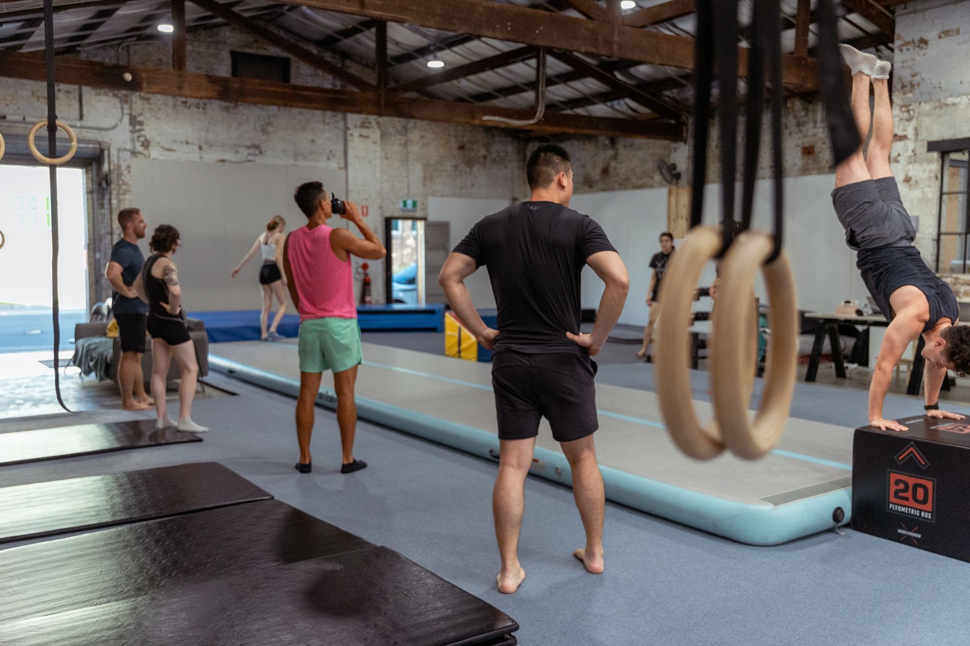 Image of people doing gymnastics in the gym