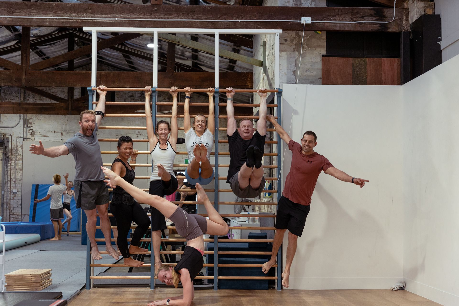 Image of people posing for a picture in the gym