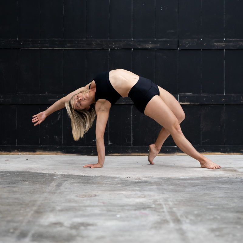 Image of doing flexibility moves in the gym