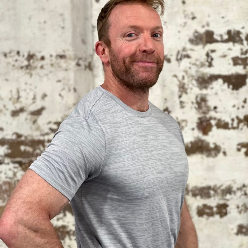 Image of a guy wearing a white t-shirt