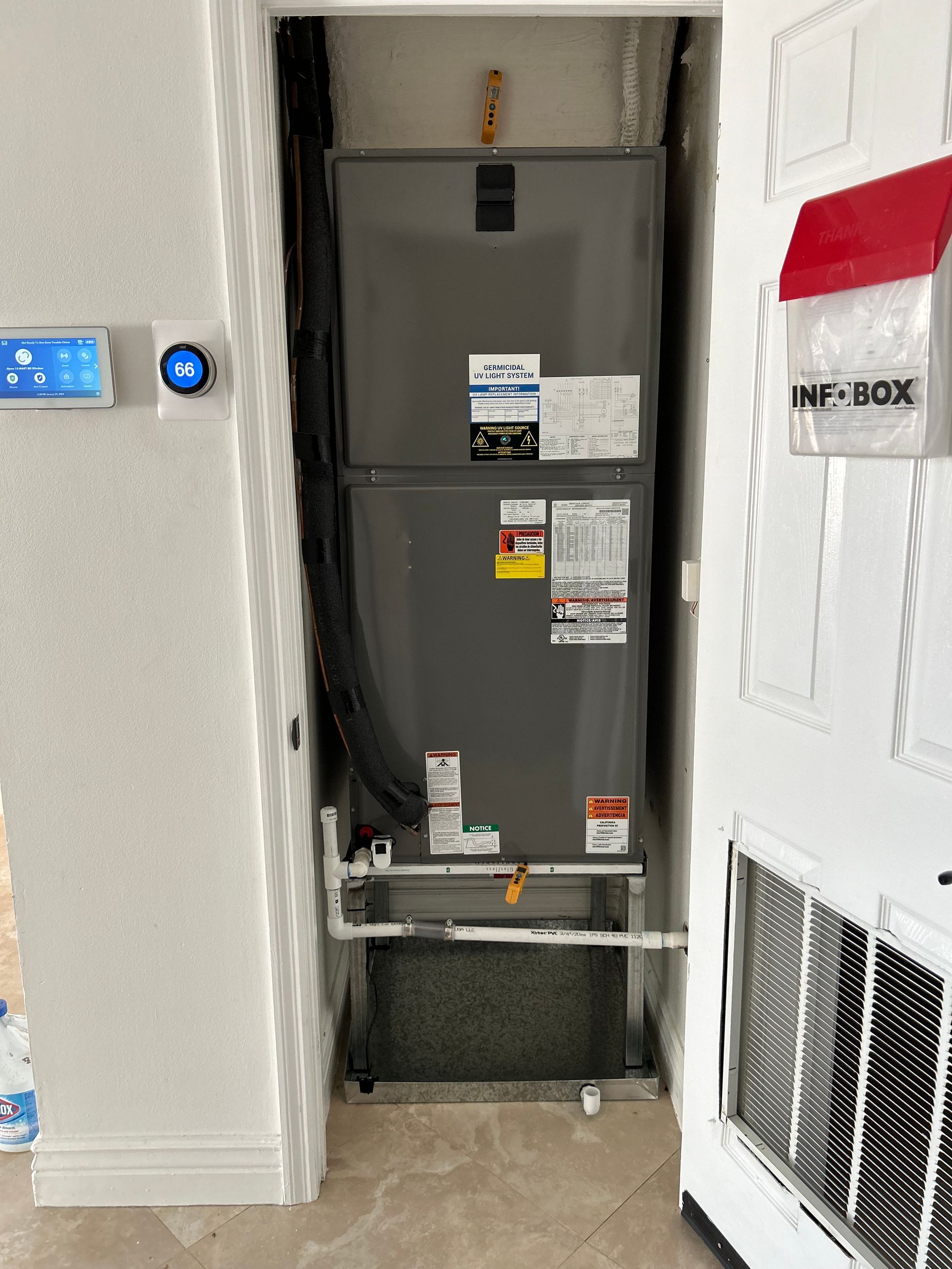 Care to Cool LLC - A refrigerator is sitting in a corner of a room next to a wall.