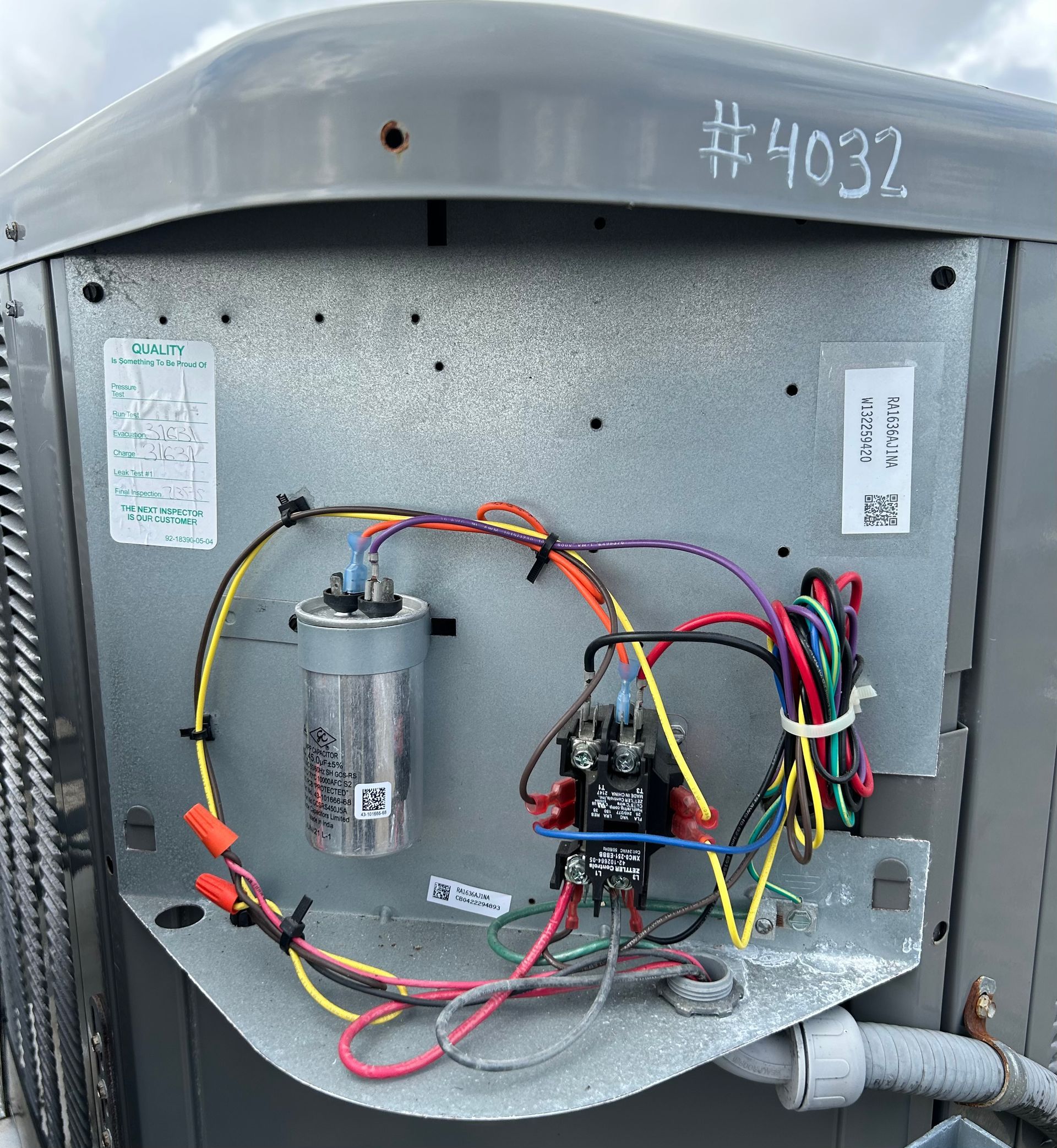 Care to Cool LLC - The back of an air conditioner with the number 4032 written on it