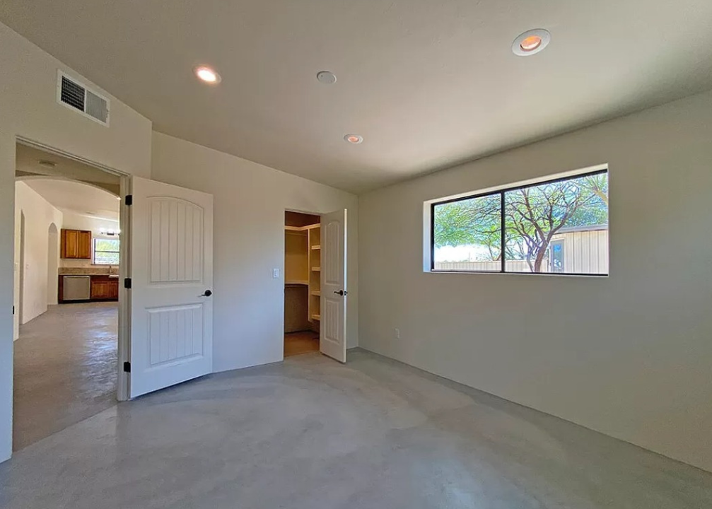 bedroom addition, remodel, concrete floors