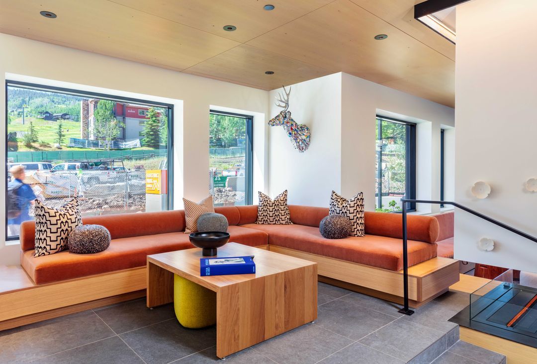 A living room with a couch and a coffee table