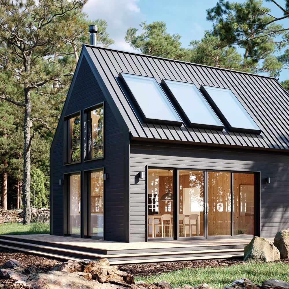A black house with solar panels on the roof