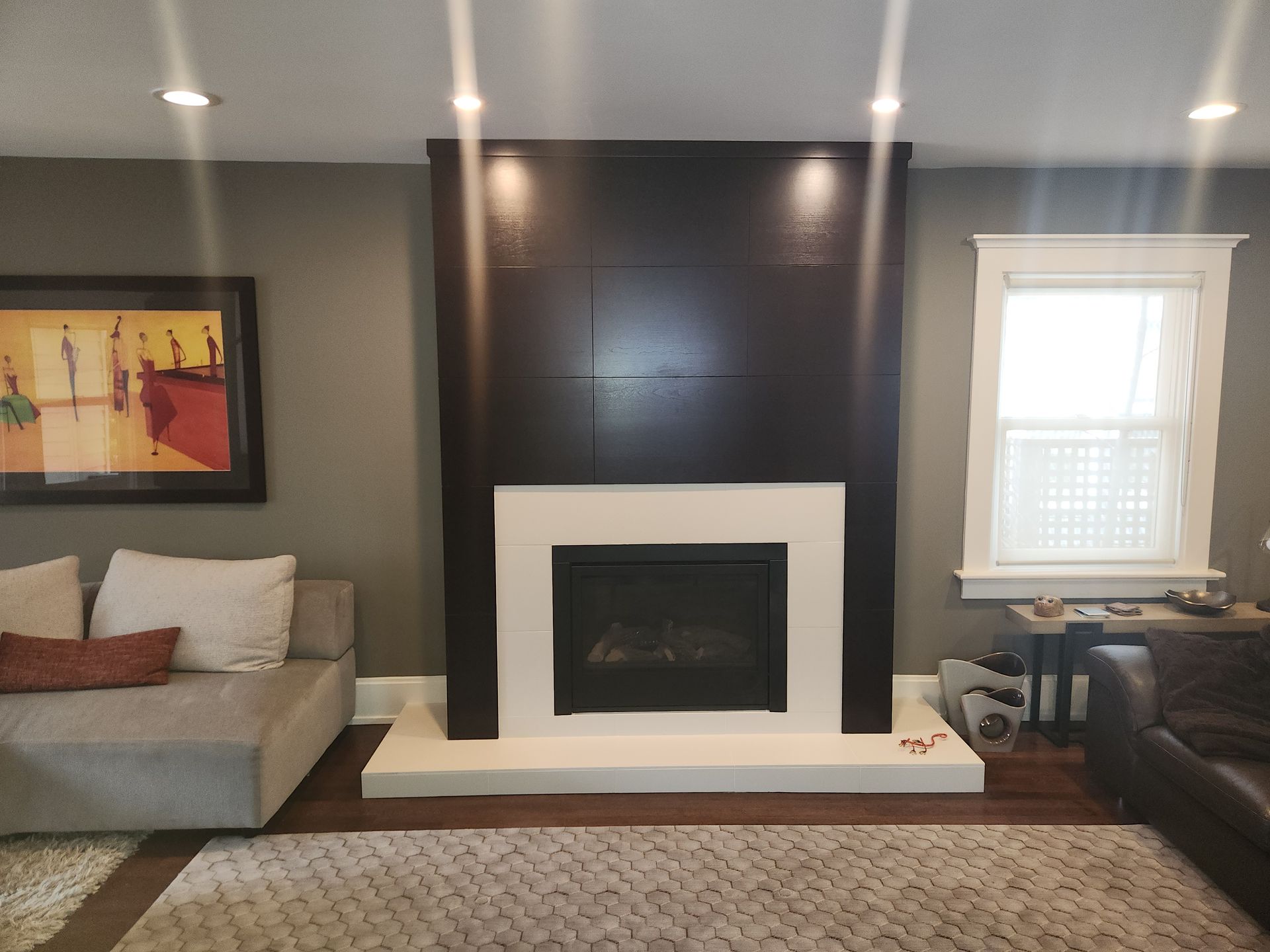 A living room with a fireplace and a couch