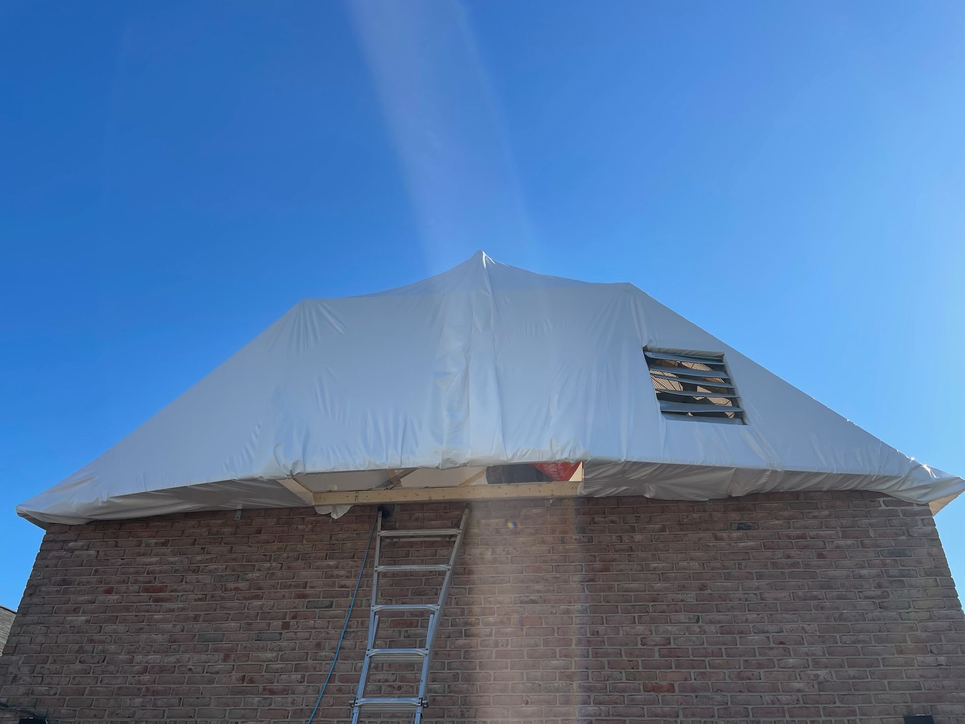 Custom 365 Construction Tent with custom access opening