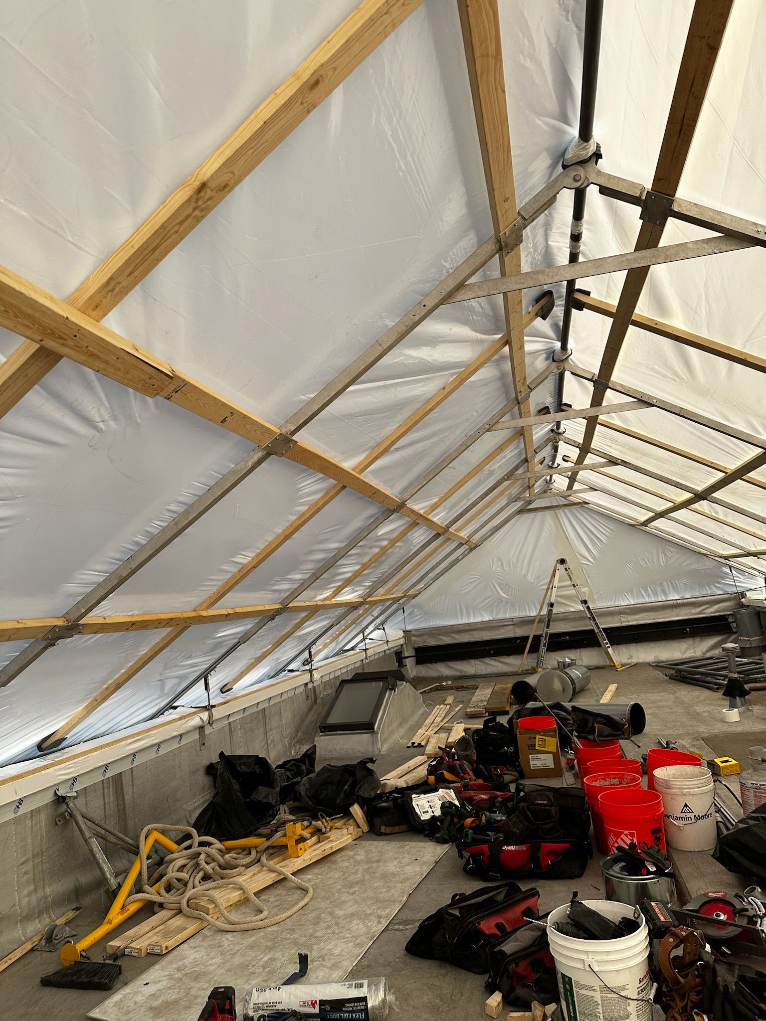 Standard 365 Construction Tent keeps 4 unit building, materials and tools dry in Uptown, Chicago