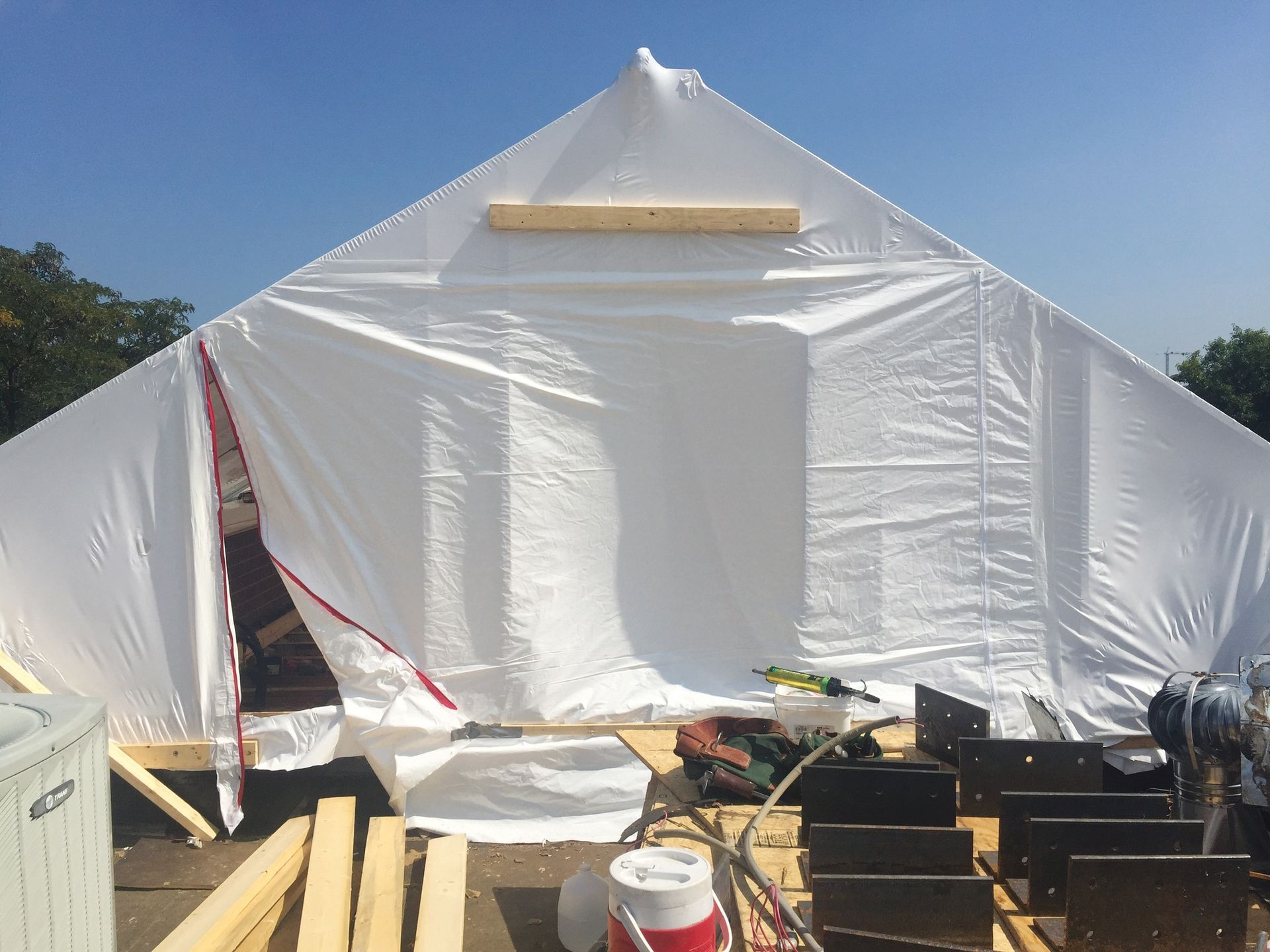 Standard 365 Construction Tent installed on roof, zipped shut