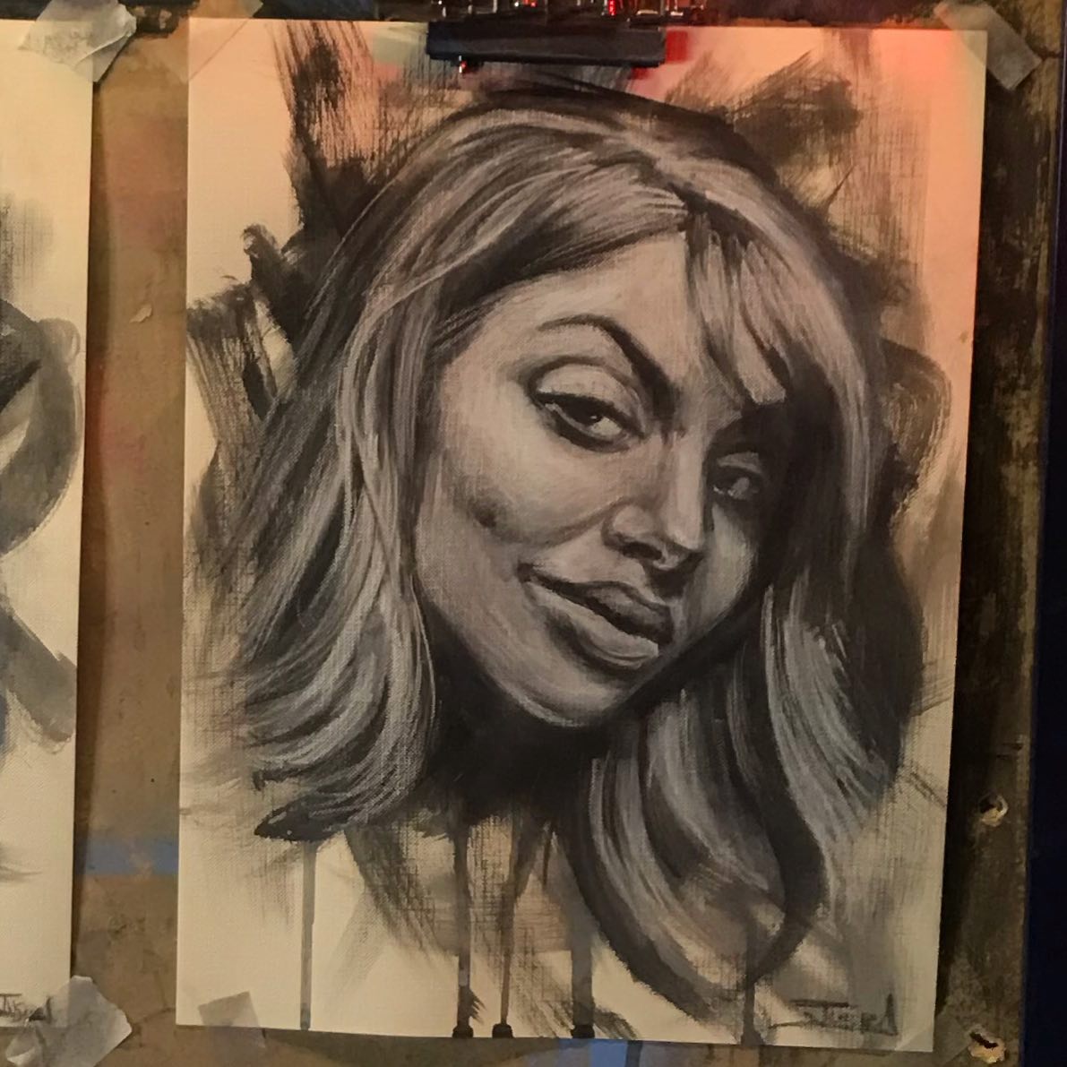 A black and white drawing of a woman 's face