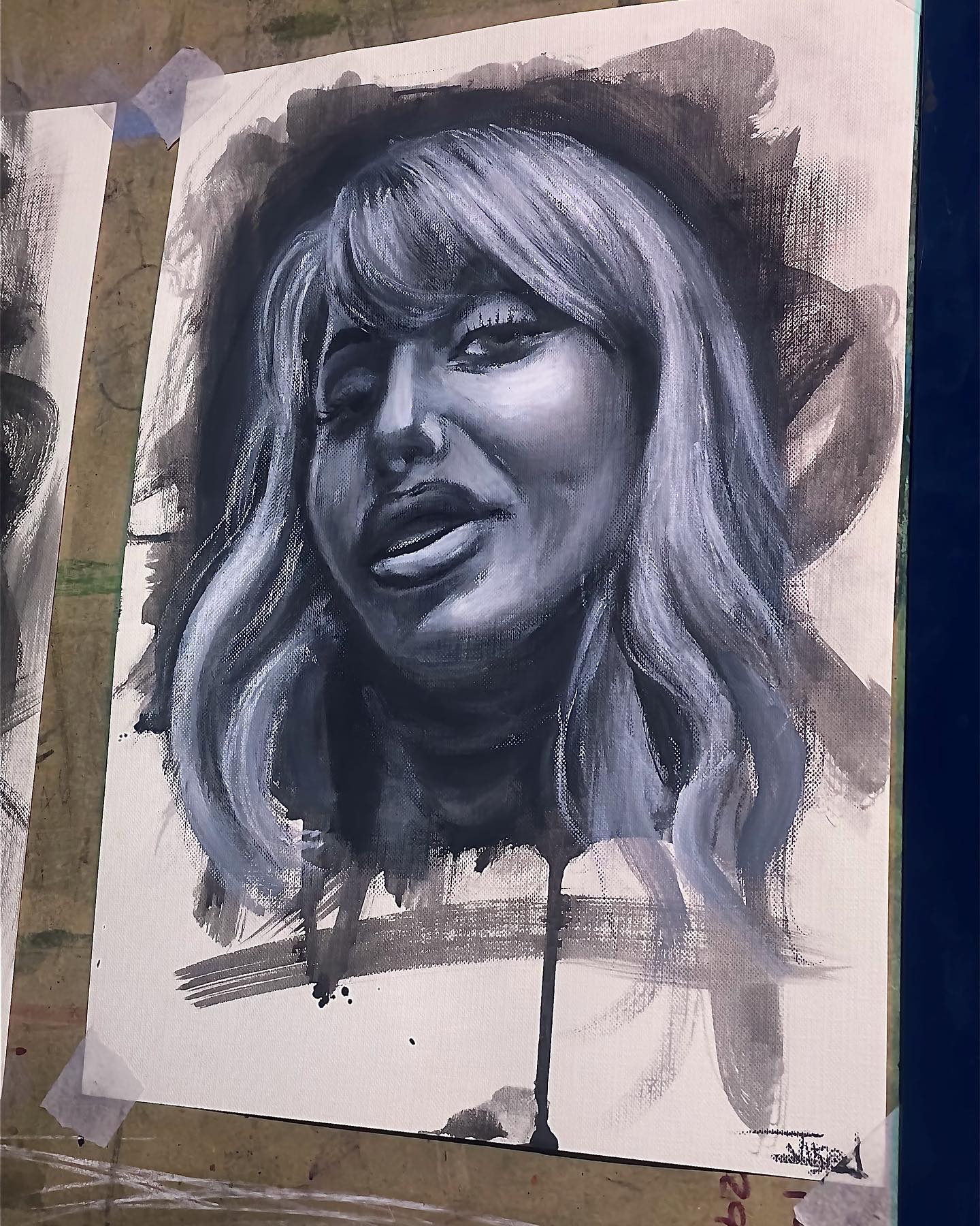 A black and white painting of a woman 's face