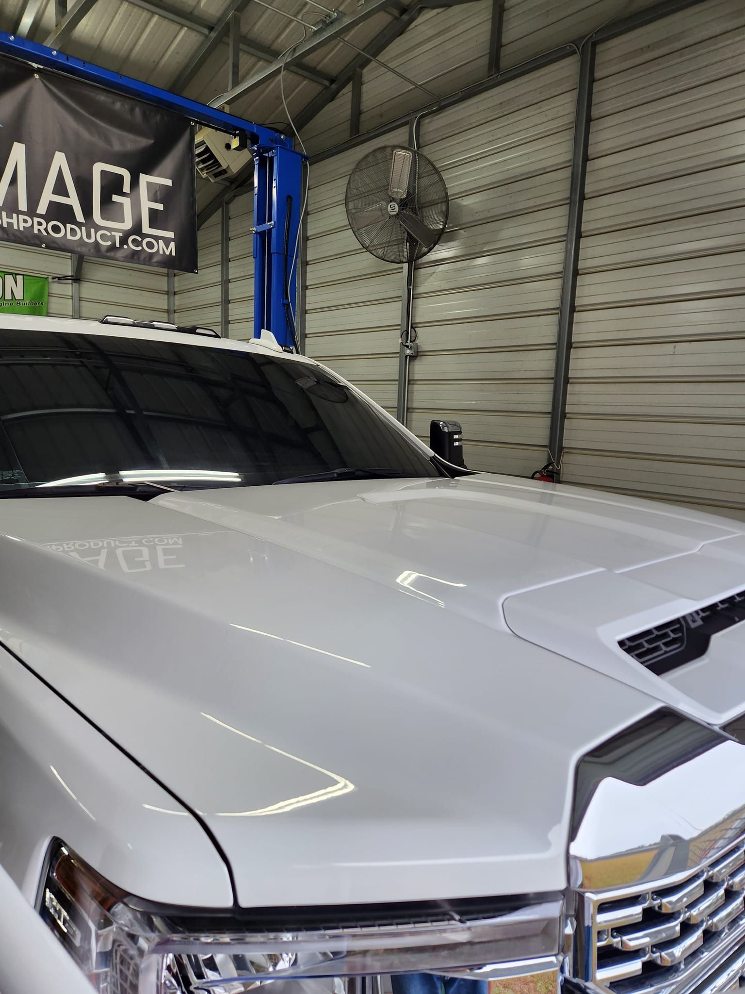 Close-up of the Hood and Front End of a White Pickup Truck — Valentine Detailing LLC in Walterboro, SC