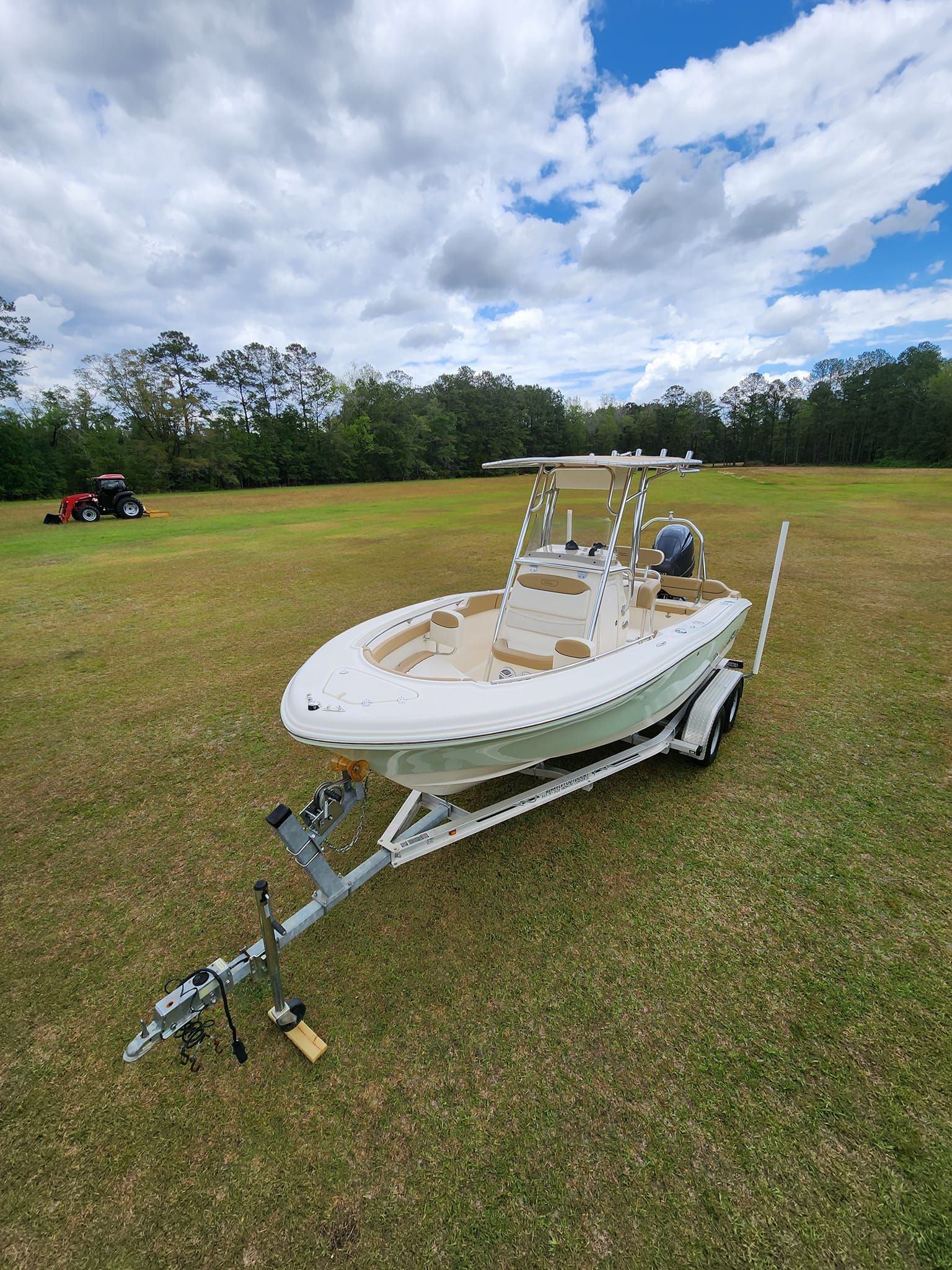 A Light-colored Center Console Boat on a Trailer Parked — Valentine Detailing LLC in Walterboro, SC