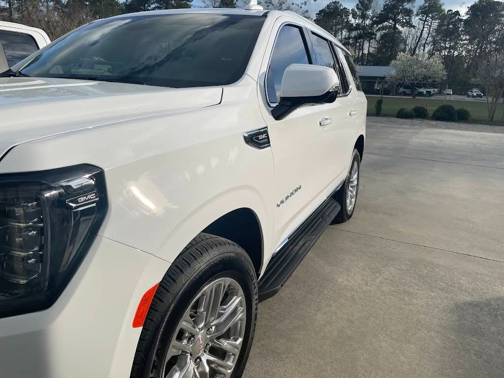 A White SUV Parked on a Paved Lot — Valentine Detailing LLC in Walterboro, SC