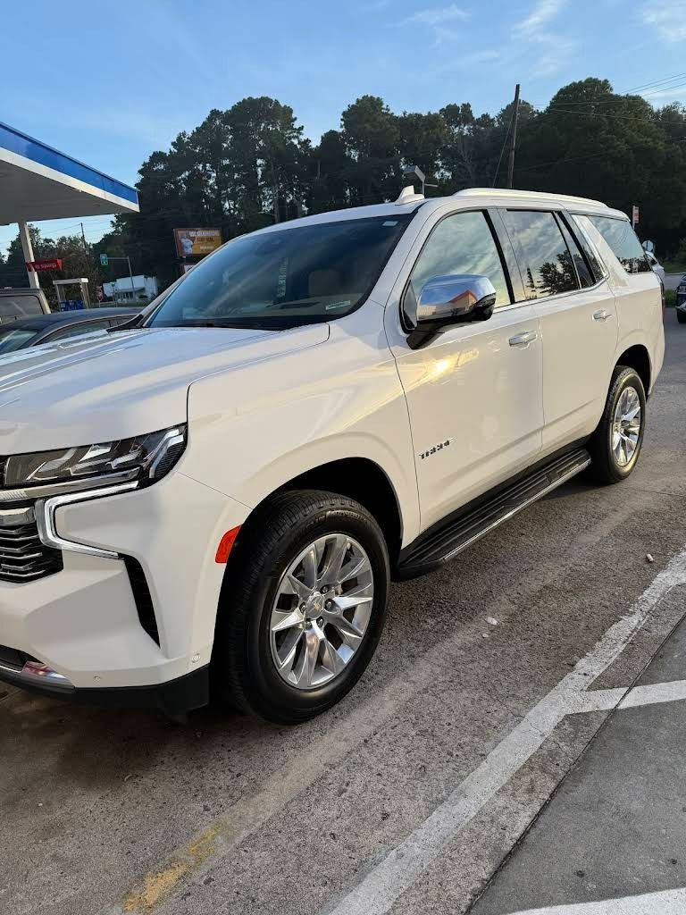 A White Chevrolet Tahoe SUV Parked at a Gas Station — Valentine Detailing LLC in Walterboro, SC