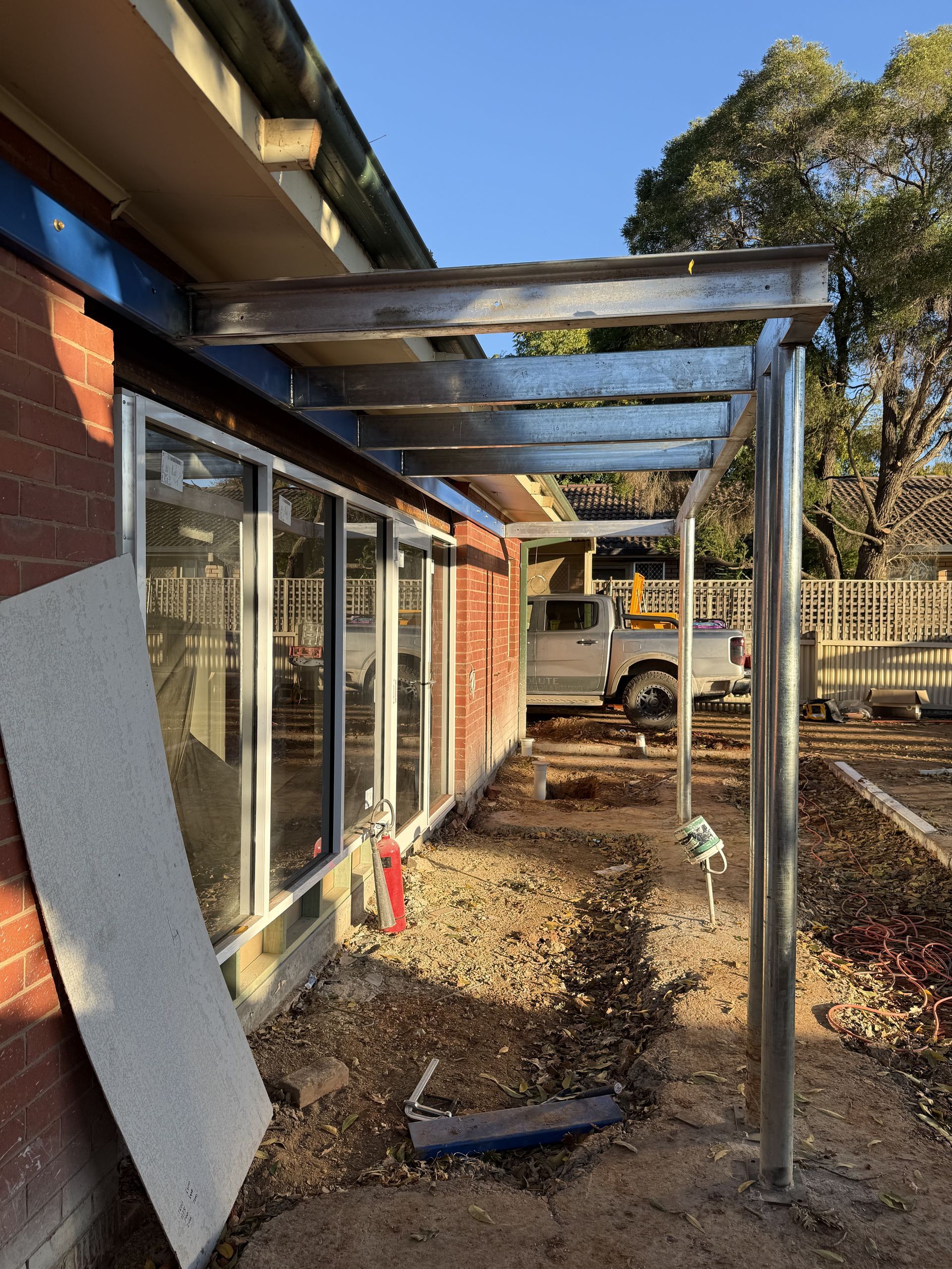 Red Brick Building Steel Structures off it — Absolute Steel Fabrication & Welding In East Wagga Wagga, NSW