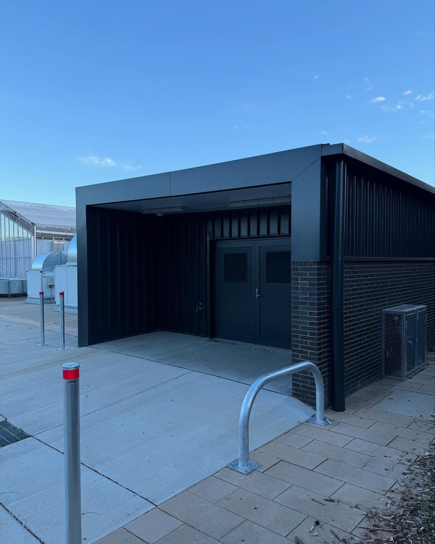 Black Building With Ramp and Door, Accessible Entrance — Absolute Steel Fabrication & Welding In East Wagga Wagga, NSW