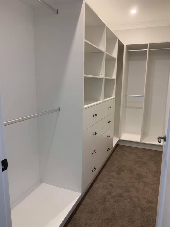 A Walk in Closet with Lots of Shelves and Drawers — GMT Builders Pty Ltd in Berrima, NSW
