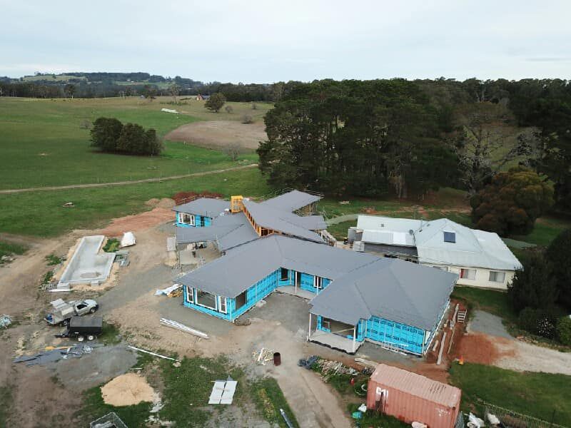 An Aerial View of A House Under Construction in A Field — GMT Builders Pty Ltd in Bowral, NSW