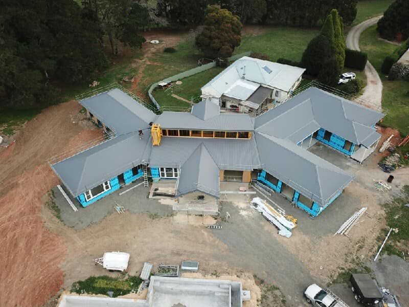 An Aerial View of A Large House Under Construction — GMT Builders Pty Ltd in Bowral, NSW