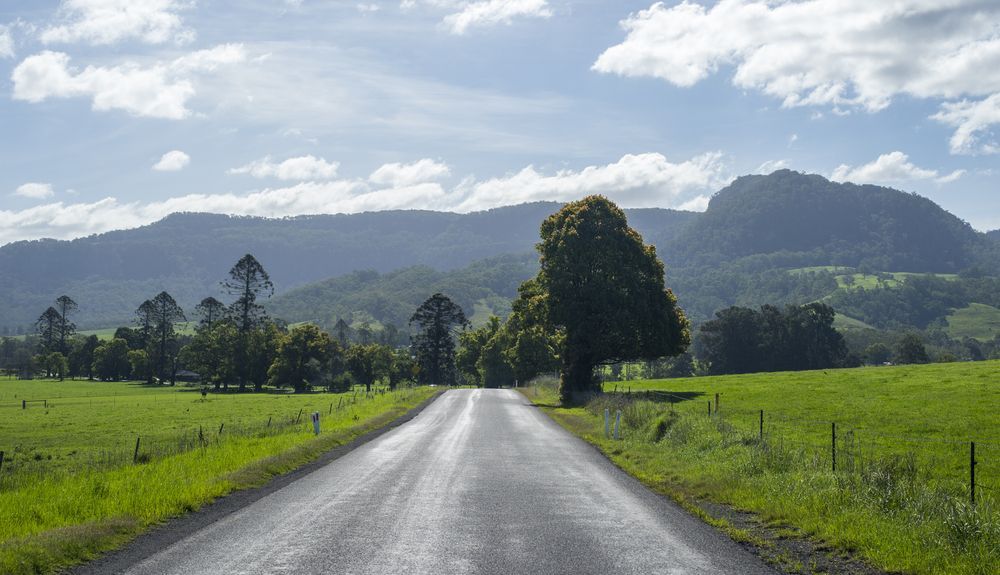 A Straight Road Going Into The Distance Toward Mountain — GMT Builders Pty Ltd in Kangaloon, NSW