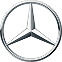 A close up of a mercedes benz logo on a white background.