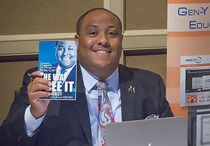 A man in a suit and tie is holding a book that says we can see it