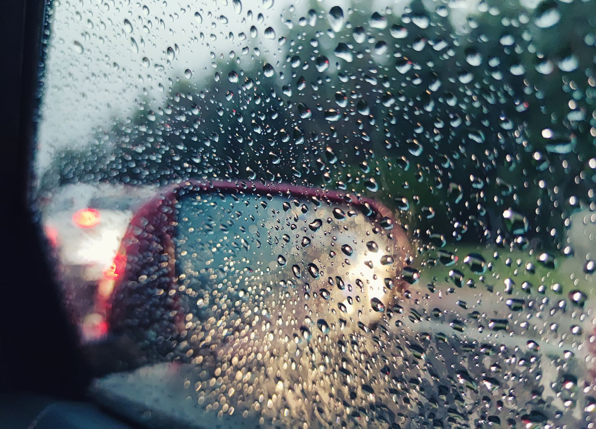 Mirror With Rain Drops - Columbus, OH - Harr's Auto Glass Inc